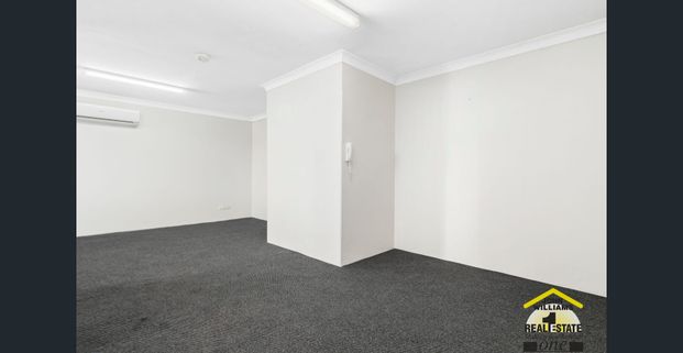 "Neat & Spacious 2-Bedroom Unit" - Photo 1