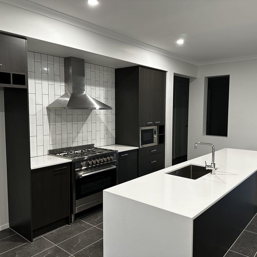 Spacious & Modern Family Living in the Heart of Clyde North - Photo 1