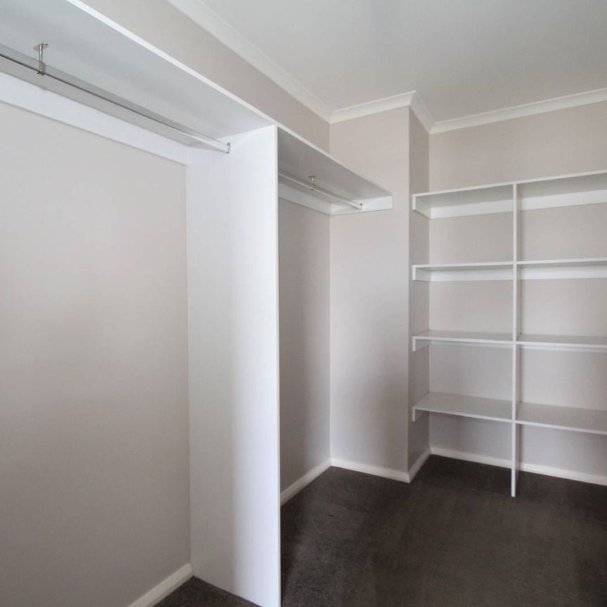 FAMILY HOME WITH THREE SEPARATE LIVING AREAS AND STUDY SPACE - Photo 1