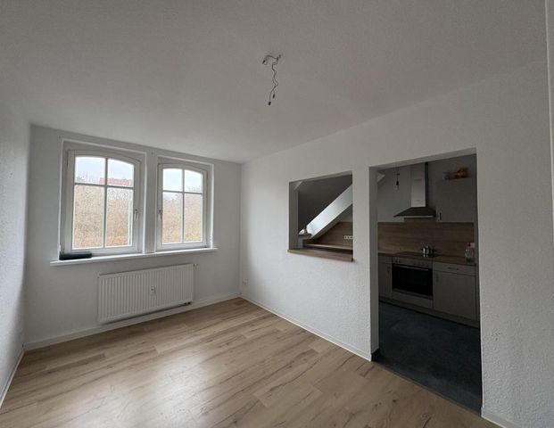 Zentral gelegene Dachgeschosswohnung mit Einbauküche in Zwickau - Photo 1