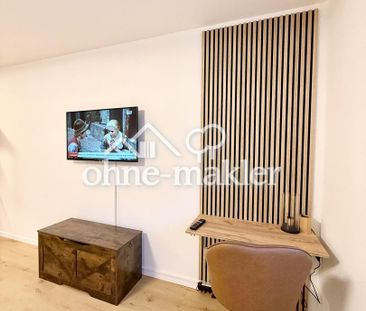 Erstbezug nach Sanierung – hochwertig möbliertes Apartment mit Tief... - Photo 5