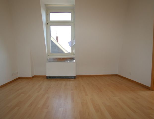 Gemütliche Dachgeschosswohnung mit 3 Zimmern und ca. 60 m² Wfl. in ruhiger Wohnlage - Photo 1