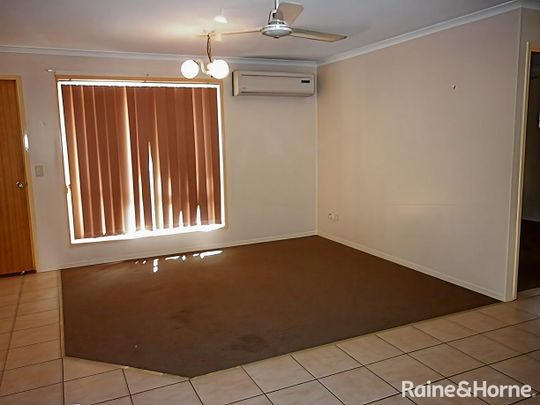 LOW SET FULLY FENCED FAMILY BRICK HOME - Photo 1