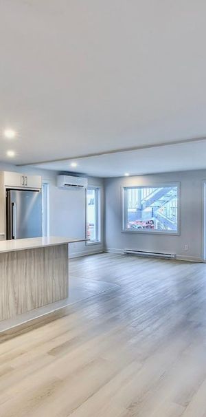 CONDO 5 1\2 FLAMBANT NEUF + 5 ÉLECTRO INCLUS + GRAND BALCON + STATIONNEMENT - Photo 1