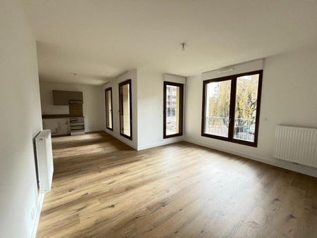 location Appartement T3 DE 65.55m² À BRUGES - Photo 3