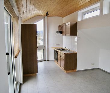 Gemütliche Singlewohnung im Dachgeschoss! - Photo 1