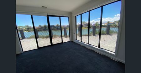 STUNNING ARCHITECTURALLY DESIGNED 4 BR HOME ON WATER- WITH A PRIVATE LIFT - Photo 2