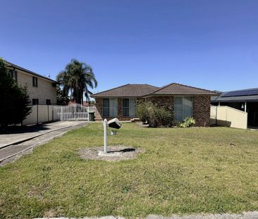 Comfortable 3 Bedroom Home with a Spacious Backyard! - Photo 1