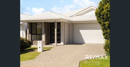 Modern 4-Bedroom Family Home in Riverbank Estate - Photo 2