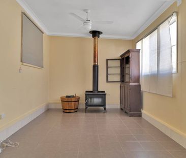 Classic Comfort in Centenary Heights - Photo 6