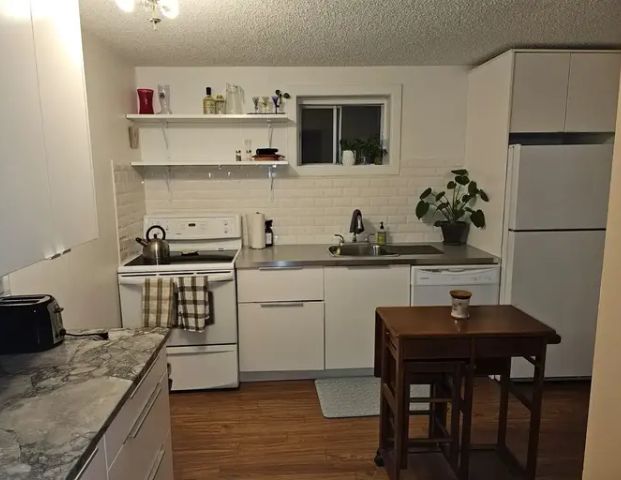 Secondary Suite with Wifi, Utilities, and TV Included | 2031 51 Avenue Southwest, Calgary - Photo 1