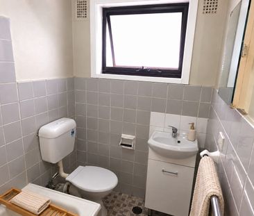 Light-Filled Top Floor Apartment – Walk to Belmore Station & Shops! - Photo 5