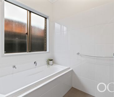 Open the Door to Coastal Comfort and Contemporary Living - Photo 3