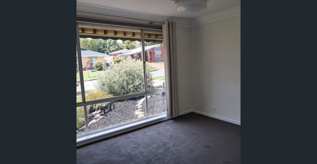 Spacious 4-Bedroom Home with Multiple Living Areas - Photo 1