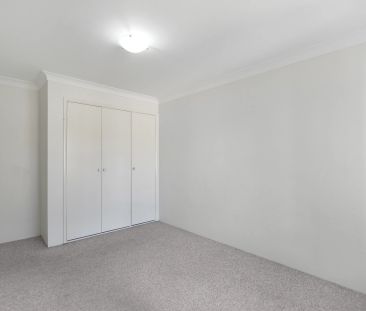 SPACIOUS TWO BEDROOM UNIT ON TOP FLOOR - Photo 1