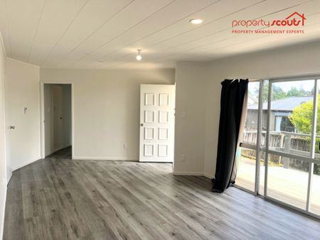 Comfortable 4-Bedroom Home With Large Yard & Rumpus - Photo 3