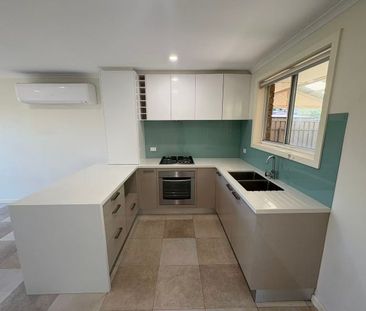 Cozy and Quiet 2-Bedroom Unit in a Safe and Beautiful Community - Photo 3