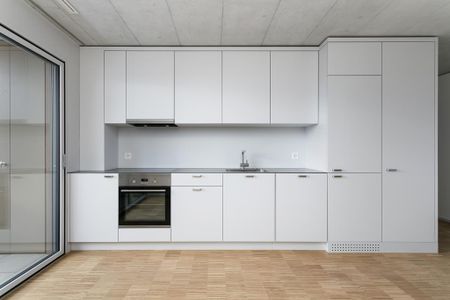 Modernes Hochhausfeeling an bester Lage - Foto 3