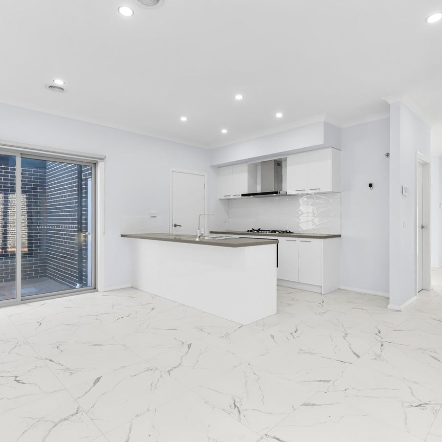 Spacious & Light-Filled Home in Prime Location - Photo 1