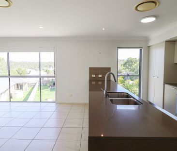 STUNNING HOME WITH ENTERTAINER'S DECK! - Photo 2