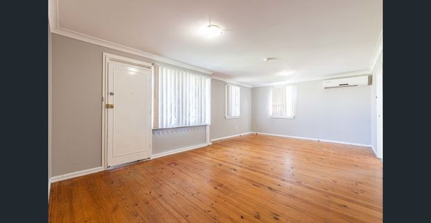 Neat and tidy home in a very central location! - Photo 1