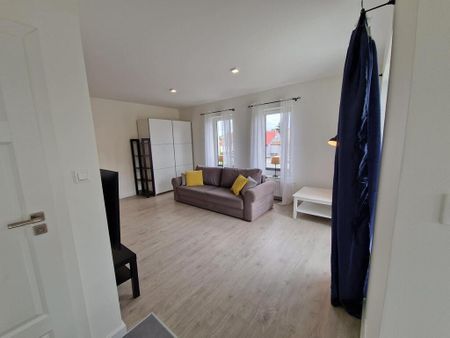 Dwupoziomowe 77 m² z miejscem parkingowym - Photo 2