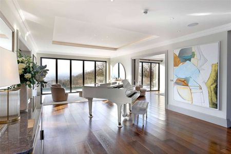 A modern Six-Bedroom Detached Family Home on Harvest Hill with extensive views - Photo 4