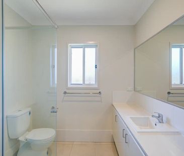 “Spacious Family Home in Collingwood Park” - Photo 3