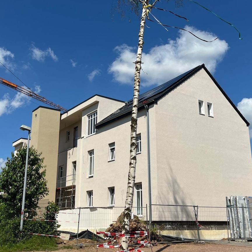 Ein architektonisches Highlight: Wohnen im historischen Schulgebäude mit modernster Technik! - Photo 1