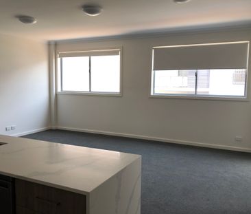 Modern two bedroom unit - 20% below market rent - Photo 2