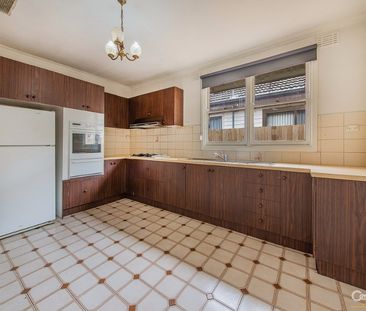 A Surprisingly Spacious 3 Bedroom Home in a Great Location - Photo 1