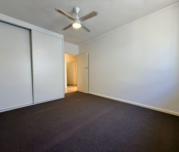 Spacious Family Home with Generous Yards in Prime Location! - Photo 4