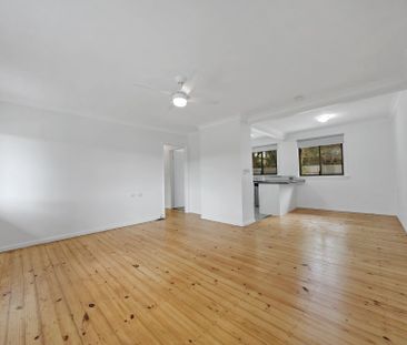 Freshly Renovated Coastal Home - Lawn Maintenance Included - Photo 1