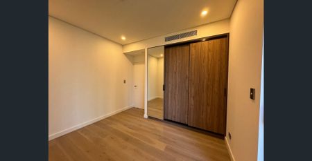 Convenience meets Luxury with this nearly-New Apartment- Level 11 - Photo 3