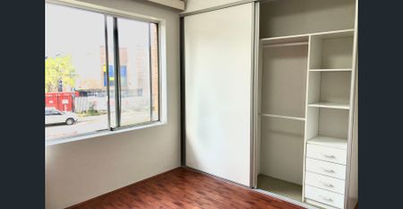 Full brick 2 bedroom unit with lock-up garage, Train Station within minutes walk - Photo 3