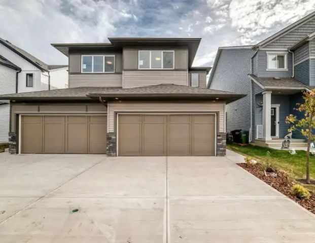 Stunning BRAND-NEW Spacious 3 Bedroom+Den Duplex (Main Floor) | 4816 Cawsey Terrace Southwest, Edmonton - Photo 1