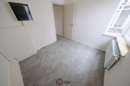 Gelijkvloers appartement in het hart van Lummen - Photo 2