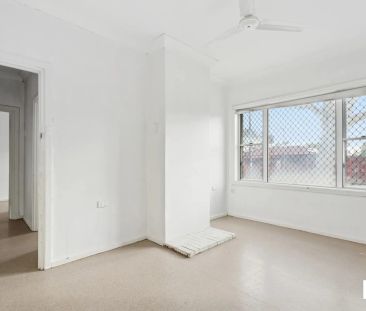 Comfortable 3-Bedroom Home with Spacious Yard in a Convenient Location - Photo 1