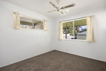 Spacious Three-Bedroom Home with Powered Shed - Photo 4