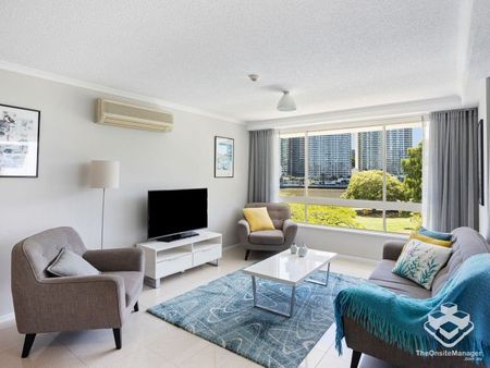 PREMIUM LOCATION! ENJOY RIVER, PARK AND BRIDGE VIEWS FROM THIS BEAUTIFULLY FURNISHED 3 BED, 2 BATH, 2 CAR APARTMENT - Photo 5