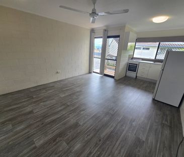 Upstairs End Unit with Balcony - Photo 1