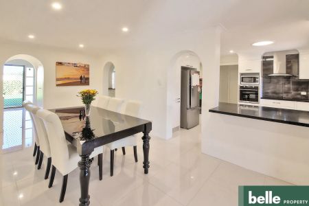 Contemporary Showpiece in Sought After School Catchment with Water & Electricity Included! - Photo 3