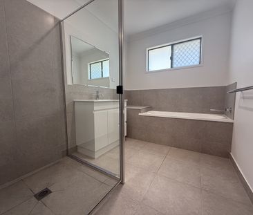 BEAUTIFUL 4 BEDROOM NEW BUILD IN BUSHLAND BEACH - Photo 4
