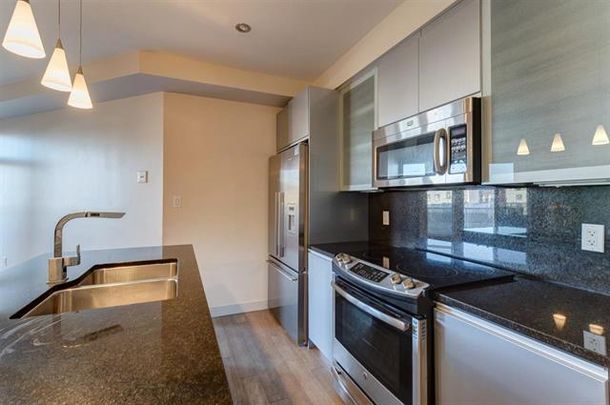 Executive 2 Bedroom Condo In The Ice District – The Quest - Photo 1