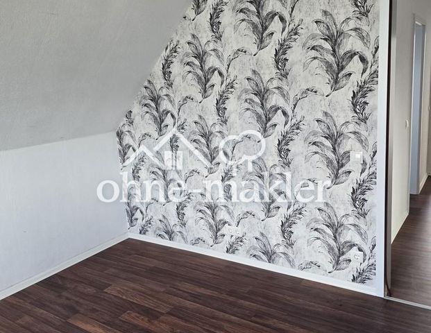 Dachgeschosswohnung mit Charme - Foto 1