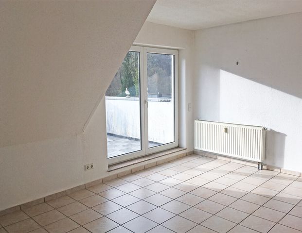 Dachgeschosswohnung mit Extras! - Foto 1