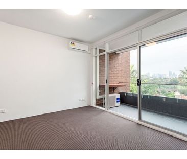 Ultra Chic Renovated Apartment with Secure Car Space - Photo 1