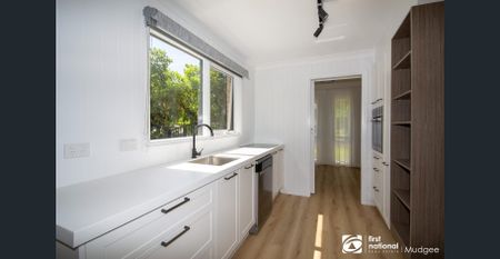 Stylish Family Home Backing onto Reserve - Photo 2