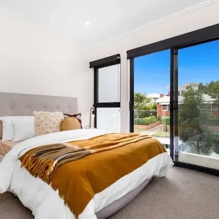 This stunning 3-bedroom, 2-bathroom townhouse in a boutique complex is now available for lease. - Photo 3