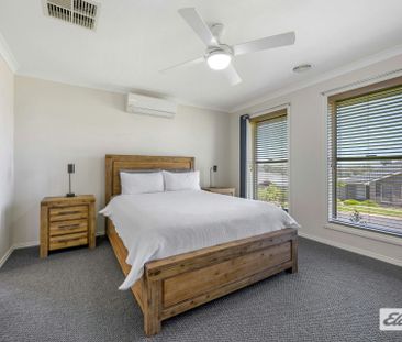 Modern Comfort Meets Effortless Family Living - Photo 6